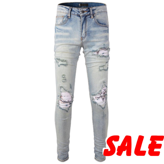 Distressed Faded Blue Ripped Jeans