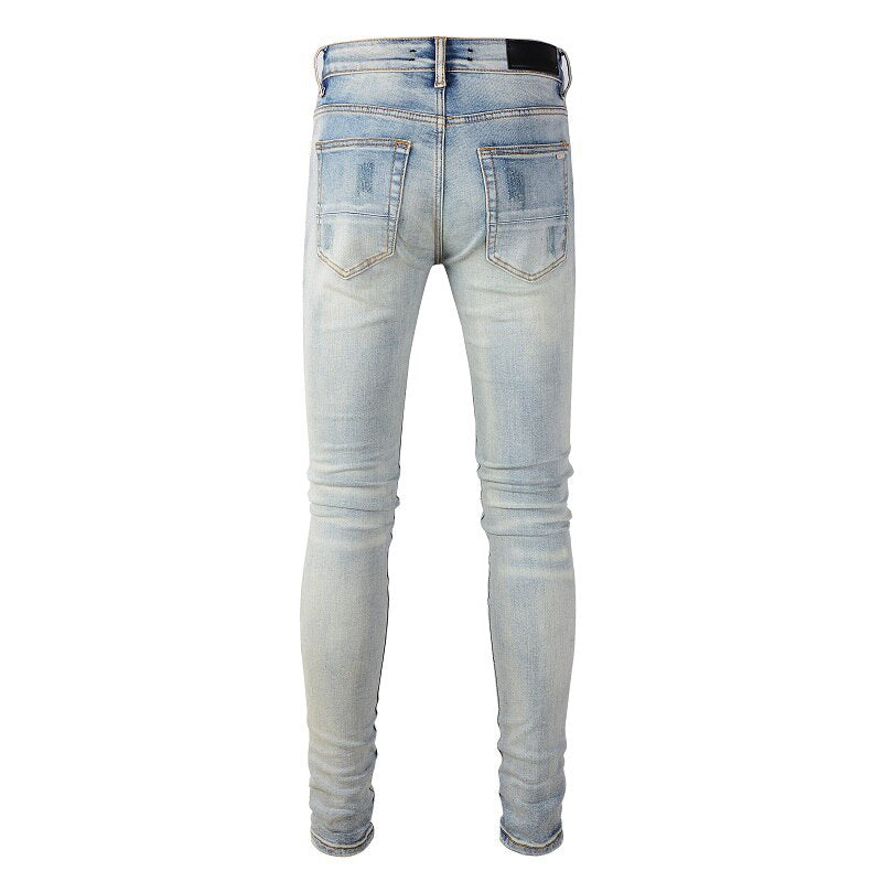 Distressed Faded Blue Ripped Jeans