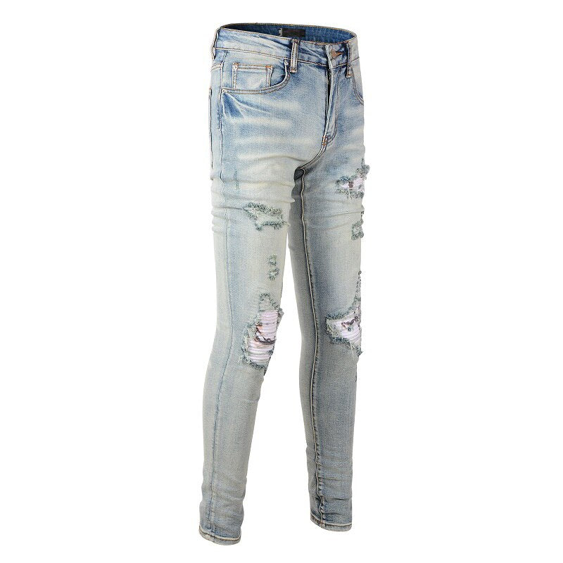 Distressed Faded Blue Ripped Jeans