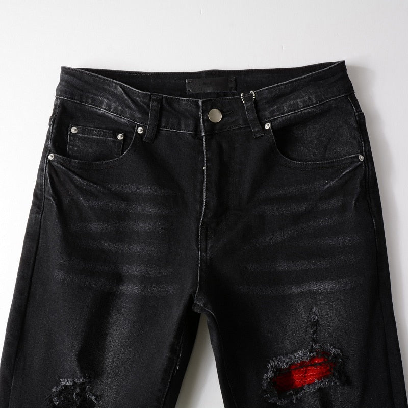 2022 Men's Black Distressed Skinny Jeans: Stretch denim with destroyed holes, red bandana, ribs patches, and ripped details. Streetwear style.