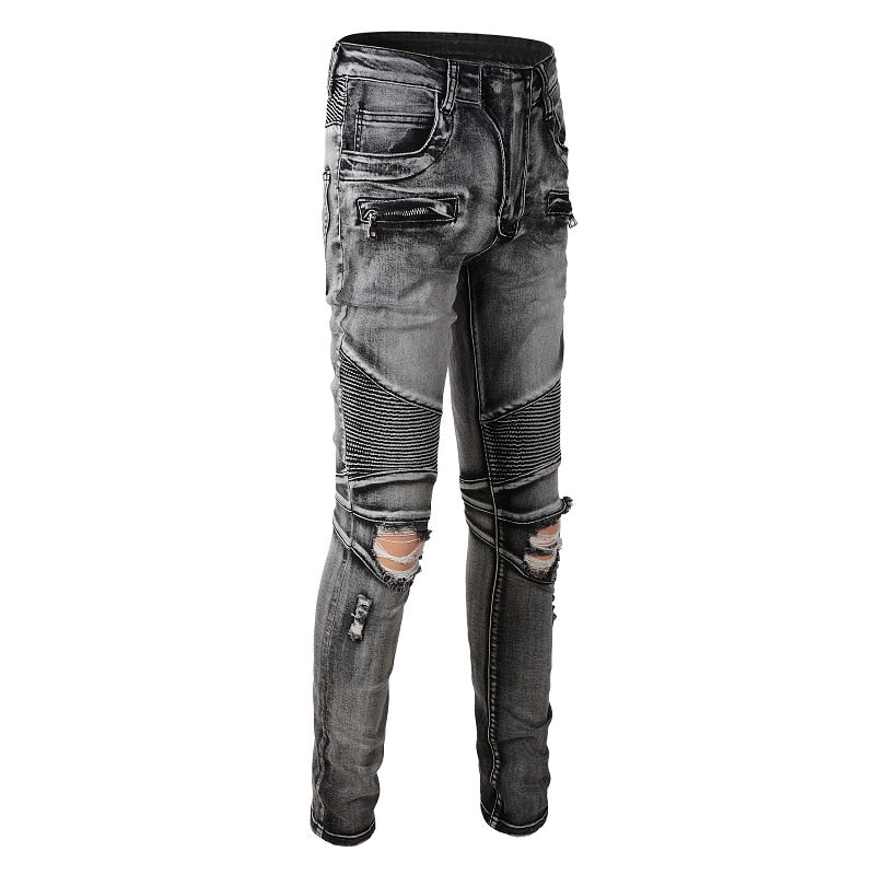 Men's distressed biker jeans with ripped patchworks, hollow out ribs, zippers, holes, and a grey washed slim stretch fit