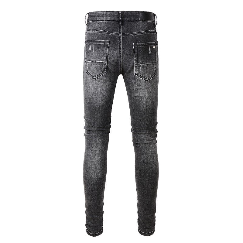 Distressed slim-fit black jeans