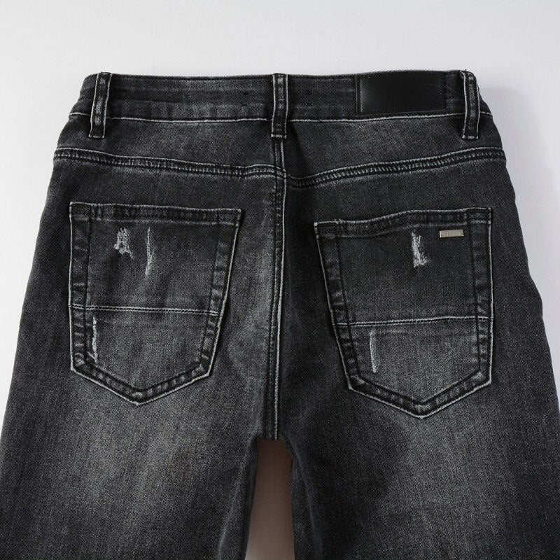 Distressed slim-fit black jeans